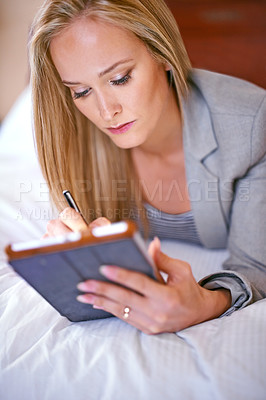 Buy stock photo Business, woman and tablet on bed with planning for corporate research, digital technology and work schedule. Professional, person and touchscreen for writing review notes or internet search in home