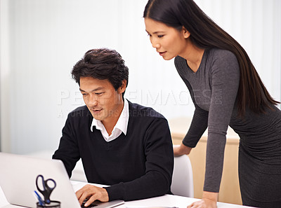 Buy stock photo Mentor, help and teamwork on laptop in office with businessman learning from support in Tokyo. Feedback, advice and manager training asian man on computer in collaboration and reading online research