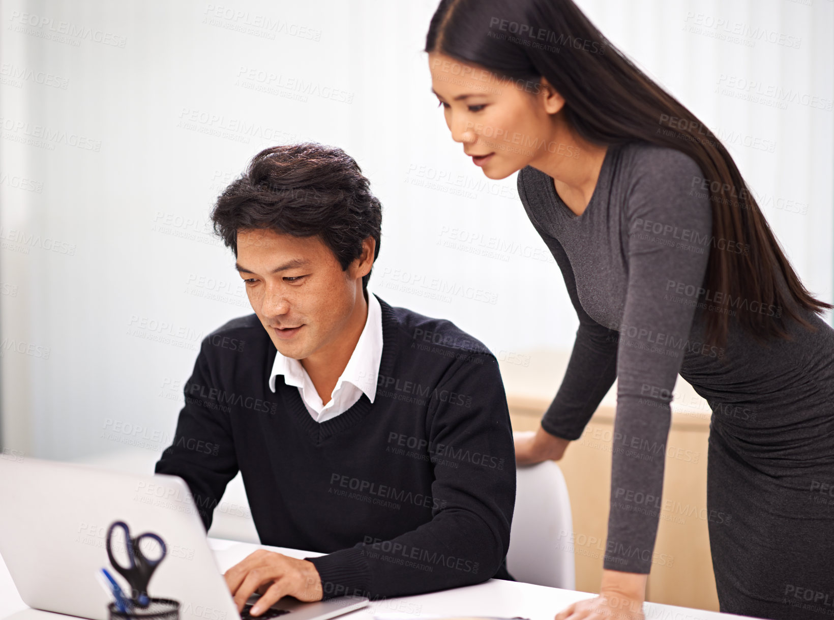 Buy stock photo Mentor, help and teamwork on laptop in office with businessman learning from support in Tokyo. Feedback, advice and manager training asian man on computer in collaboration and reading online research