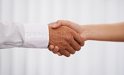 Buy stock photo Business people, handshake and meeting with agreement in partnership, deal or b2b together at office. Closeup of employees or colleagues shaking hands for greeting, thank you or teamwork at workplace