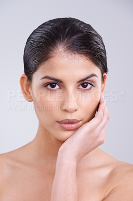 Buy stock photo Beauty, skin and woman in portrait in studio, clean and natural with cosmetic care and wellness isolated on grey background. Facial, treatment and dermatology, face with healthy glow and shine