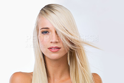 Buy stock photo Blonde woman, long hair and studio portrait with smile, wellness or results for beauty by white background. Girl, person and model for hairstyle, transformation or change with natural glow for health