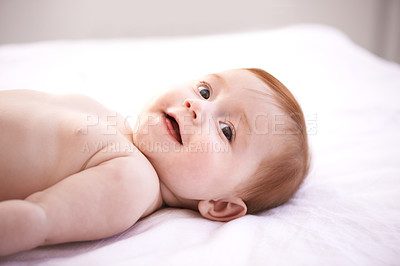 Buy stock photo Happy, girl and baby on bed with thinking for childhood development, growth and relax in nursery. Newborn, redhead and infant kid with happiness for childcare, curiosity and waking up at home