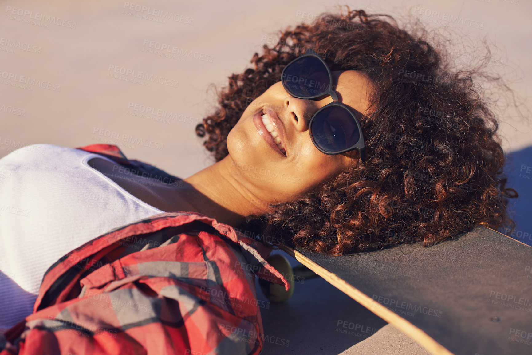 Buy stock photo Woman, skateboard and portrait in outdoor for fashion, skate and recreation for fun, active and game for break. African person and smile with glasses for style, sports and summer for cool and edgy