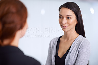 Buy stock photo Woman, smile and colleague in office for conversation, listen and professional for career and job indoor. Coworkers, colleagues and happy for partnership, advice and collaboration in company  