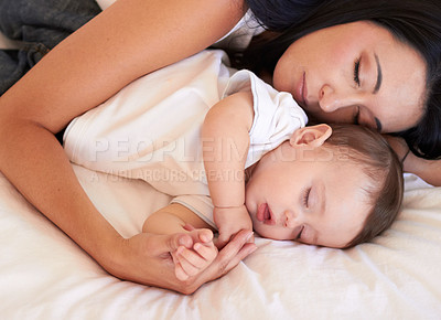 Buy stock photo Baby, sleeping and mother holding hands on bed with parent support, care and love. Relax, home and child sleep with mom in a house feeling tired and sleepy with mama rest with kid dreaming together