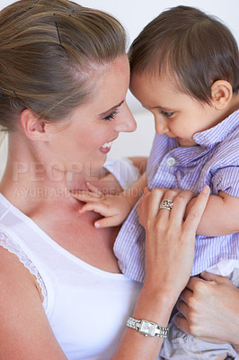 Buy stock photo Love, affection and happy family mother with baby care, motherhood and bonding with youth kid. Child development, happiness and young toddler with mom, mama or woman smile for young infant