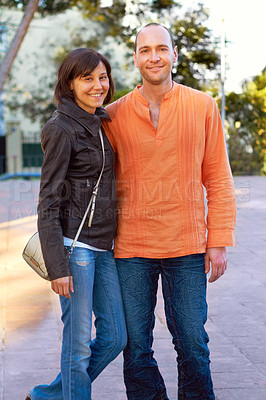 Buy stock photo Shot of a loving couple enjoying a day out together