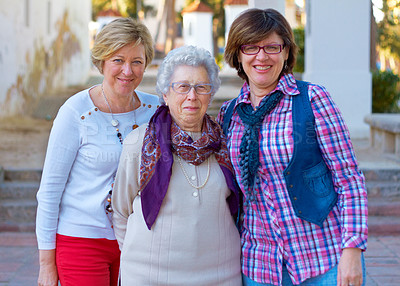 Buy stock photo Shot of three mature woman standing outdoors
