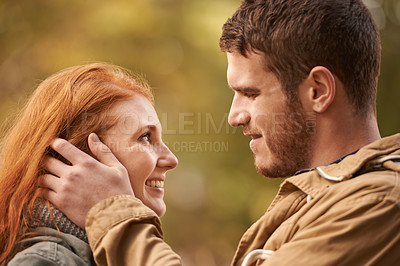 Buy stock photo Park, date and couple with love or care on holiday adventure or relax on vacation in woods. Happy, man and woman with smile for support and kindness in marriage and travel forest together in spring