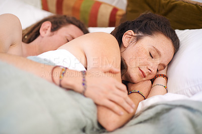 Buy stock photo Sleeping, couple and hug in bedroom in home for peace, calm or relax to dream together in the morning. Man, woman and cuddle to rest in bed for connection, comfort and embrace for love in apartment