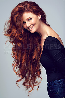 Buy stock photo Portrait, smile and haircare for female person, curls and healthy hair shine on studio background. Volume, salon and keratin treatment for redhead woman model, happy and ginger with texture hairstyle