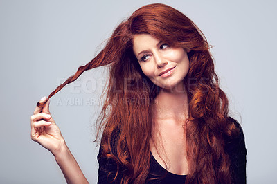 Buy stock photo Beauty, face and hair with redhead woman in studio on gray background for natural cosmetic treatment. Skincare, thinking and wellness with happy model at salon for shampoo or keratin haircare