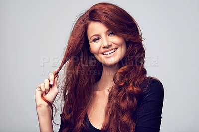 Buy stock photo Ginger, beauty and woman with hair care for red color in studio, background and mockup. Cosmetics, dye and happy portrait of girl with natural shine, healthy hairstyle or skincare on face with makeup