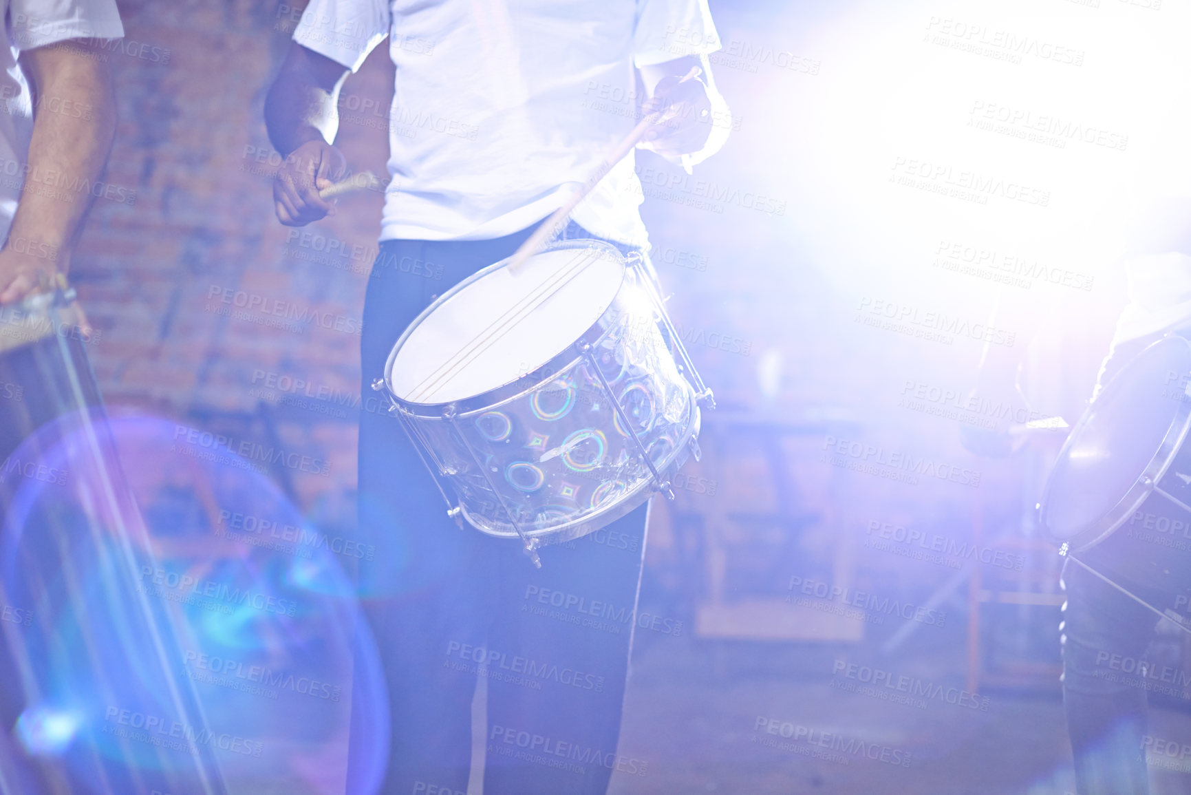 Buy stock photo Music, male drummer and entertainment or performance, show and musician in band. Concert, dark or celebration for musical artist, percussion instrument and creative talent or acoustic with lens flare