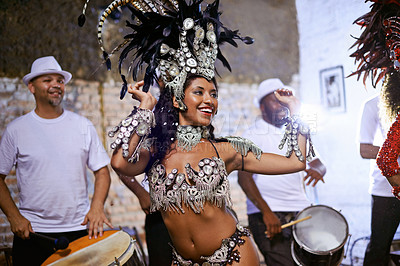 Buy stock photo Carnival, dance and cultural female dancer performing with band at mardi gras or exotic festival. Performance, costume and woman dancing with rhythm to live music for entertainment in Rio de janeiro.