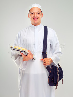 Buy stock photo Muslim man, islamic student and standing ready for religious studying, worship or spiritual education in white background. Arabic person, happy and books or culture lifestyle isolated in studio 