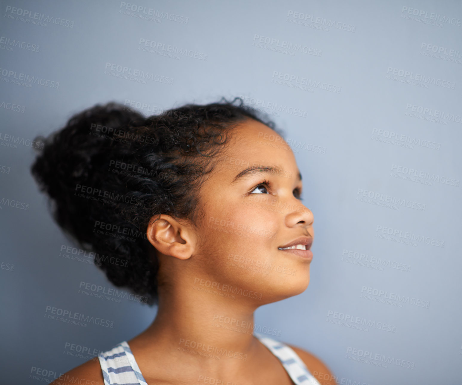 Buy stock photo Cropped shot of a young girl daydreaming