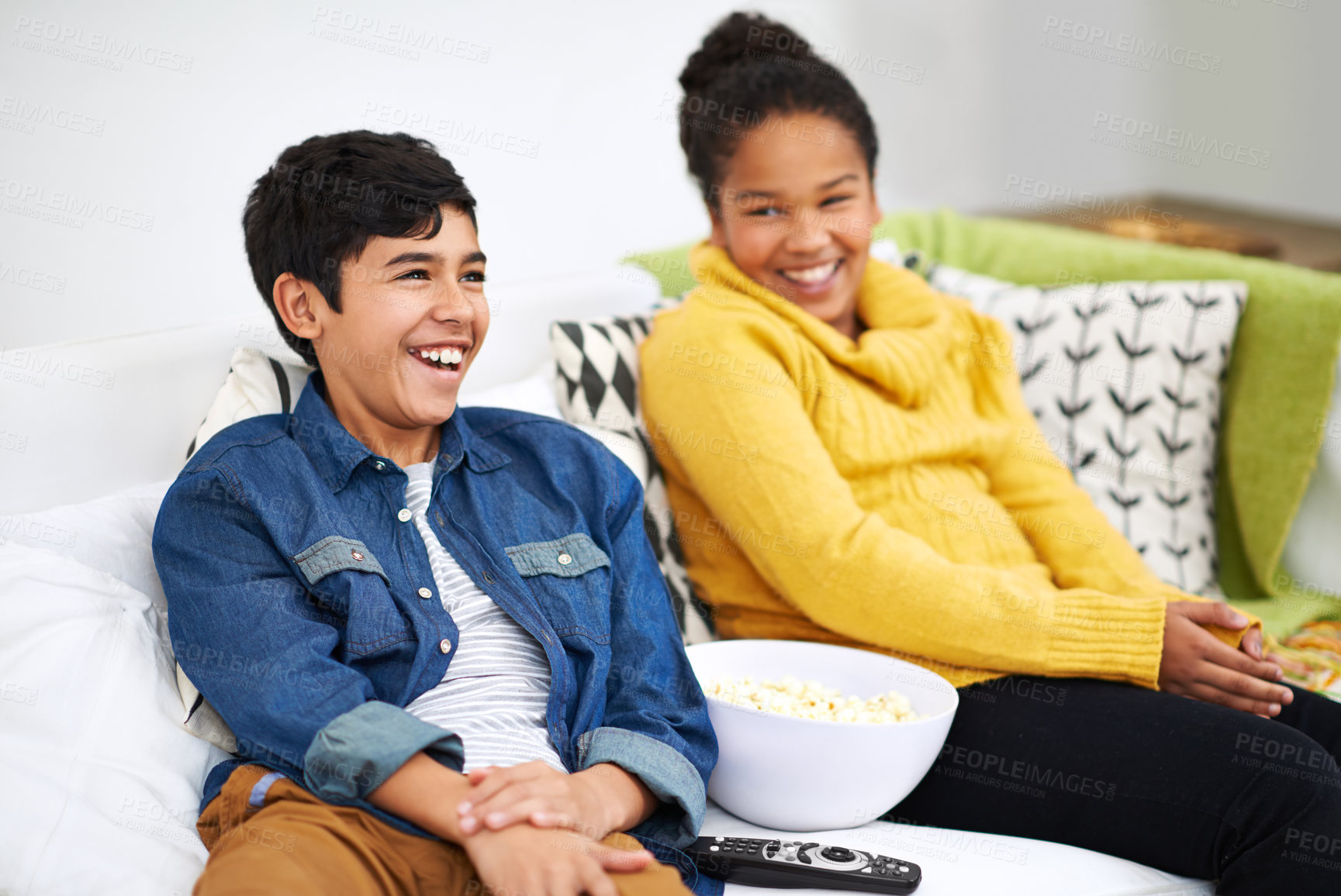 Buy stock photo Happy family, siblings or popcorn for watching television, couch or laughing for funny joke on comedy show. Boy, girl  or teenagers on sofa with cable network, relax or snack for subscription in home