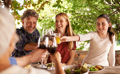Buy stock photo Family, group and wine glass for toast at table for celebration, food or friends at lunch event. Men, women or smile together to celebrate with alcohol, glasses or solidarity at party, dinner or home