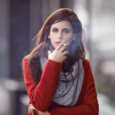 Buy stock photo Portrait, winter and woman with a cigarette, city and cold weather with addiction in New York. Face, person and girl smoking, fashion and casual outfit with season and tobacco with style or bad habit
