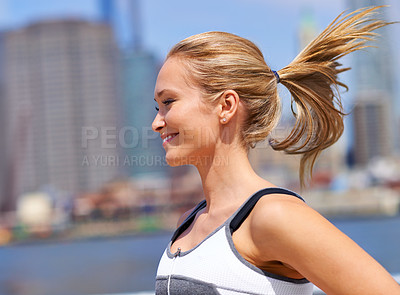 Buy stock photo Woman, happy and running for fitness in city, jogging active and fit female person exercising in New York. Energy, marathon for sports training and workout for athlete, cardio wellness and endurance