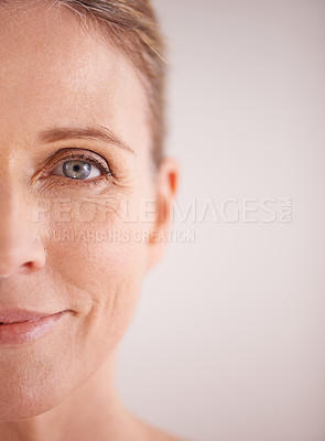Buy stock photo Cropped shot of a beautiful mature woman's face