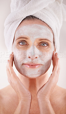 Buy stock photo Spa, mask or woman in portrait for facial, skincare in studio with natural detox or cosmetics with towel. Model, confidence or face with lotion for anti aging treatment or beauty on white background