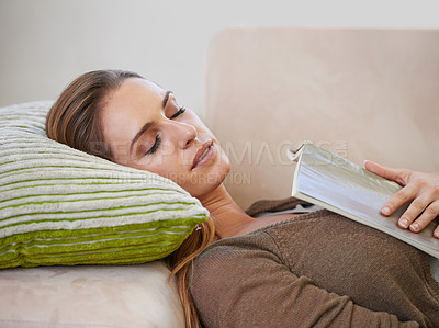 Buy stock photo Woman, book and sofa sleeping for relax weekend in living room for wellness morning, holiday vacation or calm. Female person, magazine and comfortable in apartment home for casual, peace or resting
