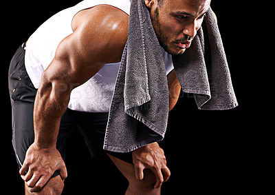 Buy stock photo Fitness, relax and man in studio with towel, sweat and exhausted commitment to muscle workout. Air, rest and tired athlete on black background for exercise, breathing and fatigue in morning training.