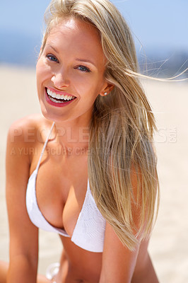 Buy stock photo A gorgeous young blonde woman enjoying summer on the beach