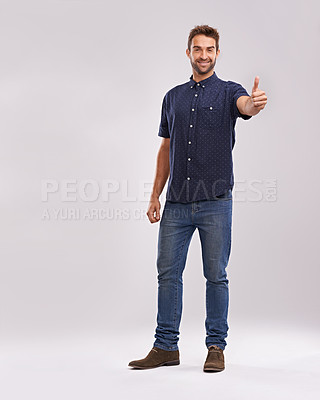 Buy stock photo Young man, portrait and thumbs up in studio for thank you, approval and promotion by grey background. Entrepreneur, smile or face for positive review in satisfaction or agreement hand sign in mockup