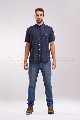 Buy stock photo Creative, fashion and portrait of businessman in studio, background and mockup with confidence. Happy, man and relax in jeans with pride or person in casual style as art director or entrepreneur