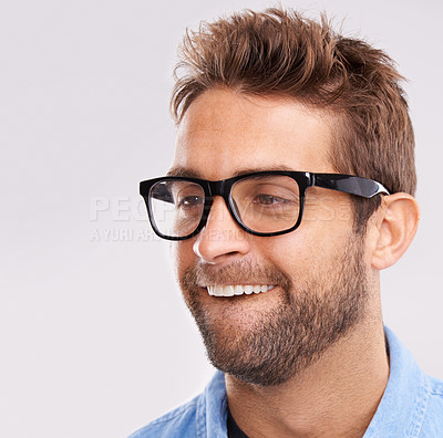 Buy stock photo Silly face, nerd and man with glasses, happiness and facial expression on a grey studio background. Model, eyewear and person with goofy guy and reaction with character and quirky with comedy or joke
