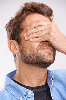 Buy stock photo Man, face palm and mistake with thinking, regret or anxiety on a grey studio background. Person, fail or model with stress or memory with embarrassing with shame or bad decision with emoji or choice