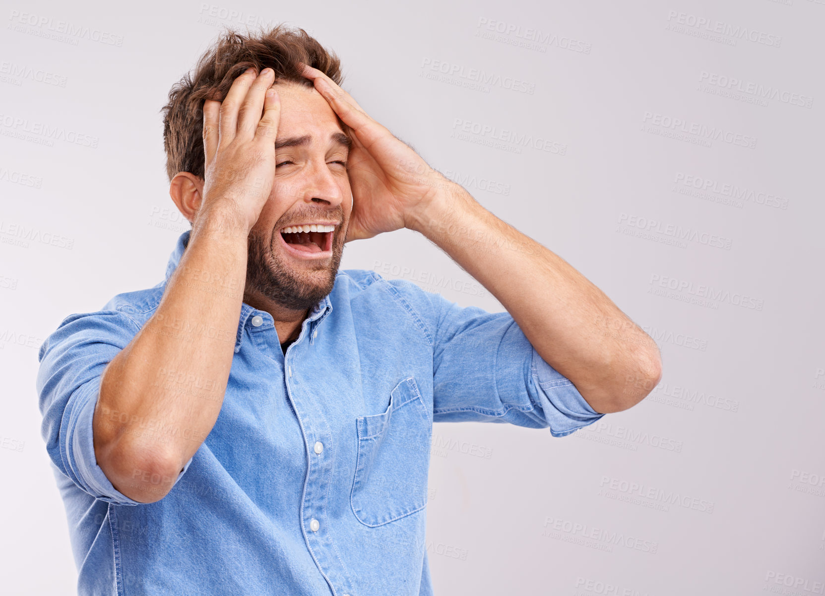 Buy stock photo Screaming, stress or sad man with hands on face in studio for mental health, crisis or mistake on white background. Anxiety, fear or male model with bad reaction to news, disaster or broken heart