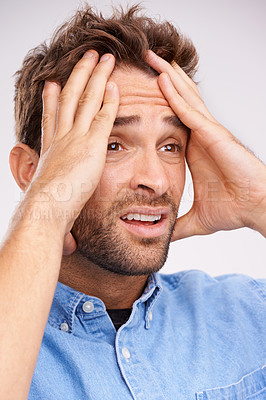 Buy stock photo Stress, fear or sad man with hands on face in studio frustrated by fail, accident or mistake on white background. Anxiety, depression or guy model overthinking trauma, conflict or overwhelmed by loss