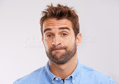 Buy stock photo Studio, portrait and bored man with doubt, frustrated and confused on white background. Opinion, disappointment and face of person with decision, conflict or uncertainty for choice, news or ideas