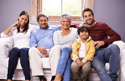 Buy stock photo Portrait of a family bonding together in the living room