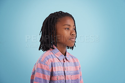 Buy stock photo Children, thinking and black boy in studio why questions, memory or reflection on blue background. Brainstorming, remember and African teen model with vision for solution, problem solving or guess