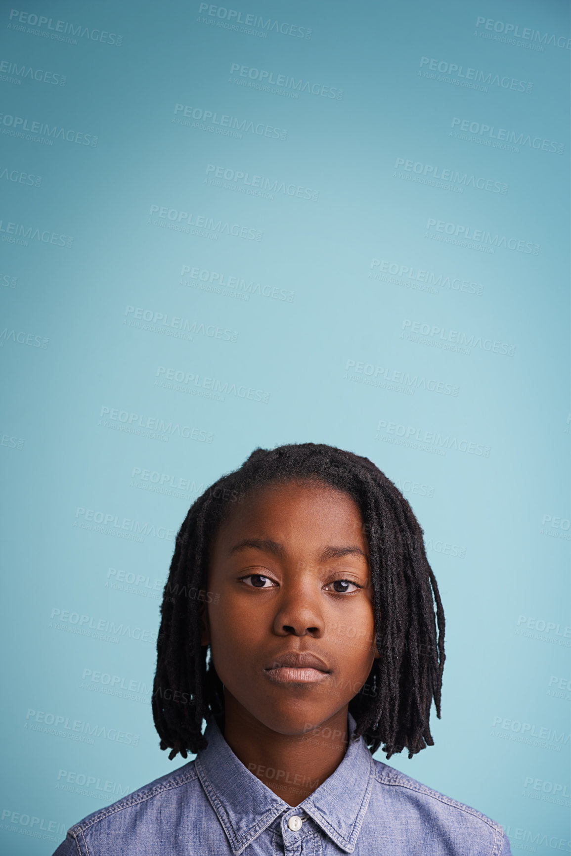 Buy stock photo Child, portrait and studio for tween, young and growing up for adolescent, innocent and growth on mockup. African person, boy or kid and serious for childhood, mood and children for puberty   