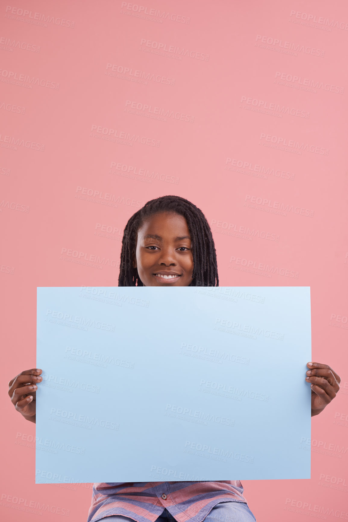 Buy stock photo Studio shot of a young boy holding a blank signboard