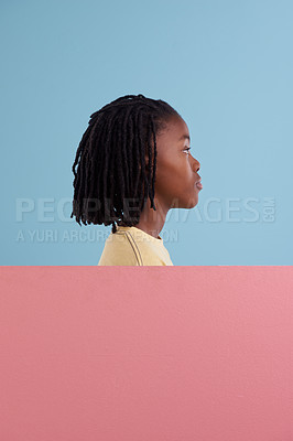 Buy stock photo Banner, mockup and African boy child thinking in studio with  questions, solution or why on blue background. Poster, space and profile of teen model with billboard for faq, problem solving or idea