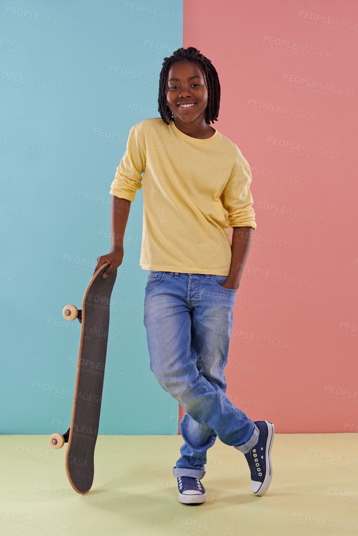 Buy stock photo Child, skateboard and portrait for fashion, colorblock and skate for adolescent, cool and playful for fun. African boy or tween and smile with toy for active, young and trendy for childhood and kids