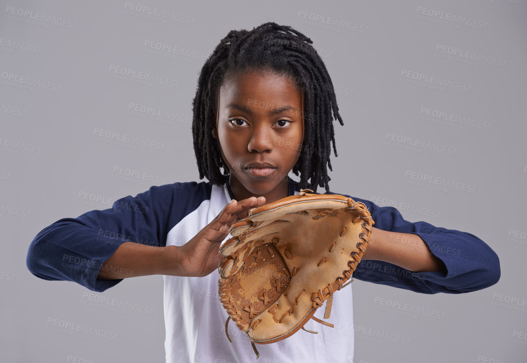 Buy stock photo Studio shot of a young boy with baseball gear