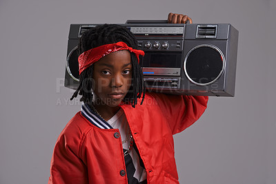 Buy stock photo Child, hip hop and portrait with radio for cool music and dance in a studio with urban clothing. Fashion, African kid and boombox with trendy clothes and rap swag with confidence and grey background