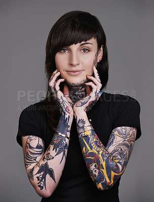 Buy stock photo Happy woman, portrait and stylist with tattoo for facial treatment, style or body art on a gray studio background. Female person, young model or smile for design, creativity or cool beauty artist