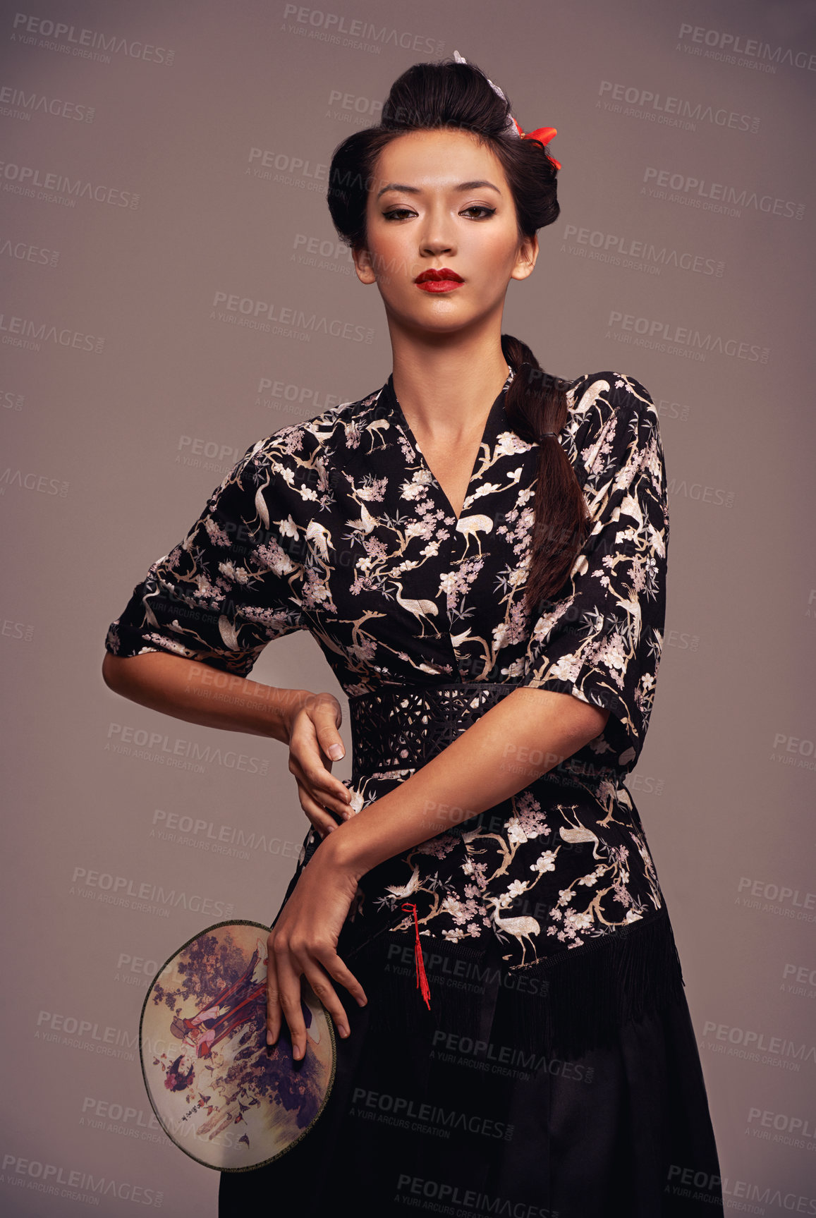 Buy stock photo Asian woman, traditional and fashion with hand mirror in  studio on brown background in confidence, style and elegant. Portrait, female person and designer clothes with outfit for heritage. 