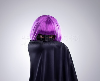 Buy stock photo Children, superhero or portrait with a girl in a cape in studio on a gray background to fight crime. Warrior, fantasy and kids with a female child in a cosplay costume for imagination or make believe