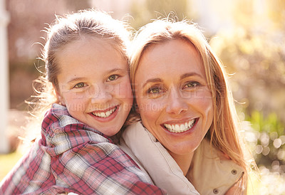 Buy stock photo Face portrait, hug and happy mother, children or family smile, bonding and spending outdoor time together. Mothers day, faces of daughter and smiling woman, youth child or young girl hugging mom